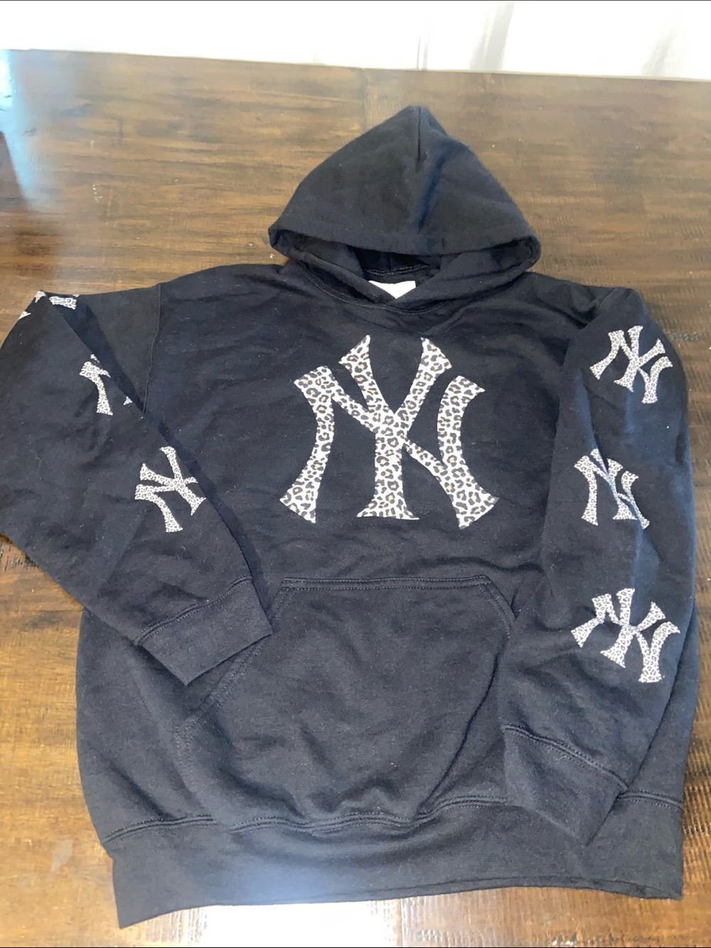 Black Hooded Sweatshirt with Leopard NY Logo - women’s medium